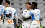 Les Marseillais se congratulent sur le but contre Troyes marqué par Pol Lirola (2e à droite)au Vélodrome, le 28 novembre 2021