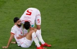 Les Tunisiens Oussama Haddadi et Yassin Meriah à la fin du match contre le Panama, le 28 juin 2018 à Saransk 