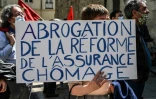 Un manifestant réclame l'abrogation de la réforme de l'assurance chômage, à Montpellier,  le 23 avril 2021
