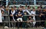 Des spectateurs assistent à la finale du tournois de bouzkachi à Mazar-e-Sharif, dans le nord de l'Afghanistan, le 8 mars 2024