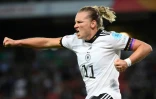 La joie de l'attaquante allemande Alexandra Popp, auteure d'un doublé lors de la victoire, 2-1 contre la France,  en demi-finale de l'Euro à Milton Keynes, le 27 juillet 2022 