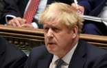 Photo fournie par le Parlement britannique montrant le Premier ministre Boris Johnson à la Chambre des Communes, à Londres le 12 janvier 2022