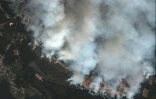 Image satellite du 18 septembre 2024 diffusée par Maxar Technologies montrant de la fumée au-dessus d'un dépôt de munitions à Toropets, dans la région russe de Tver, après une frappe de drones ukrainiens