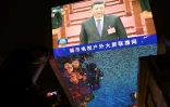 Le président chinois Xi Jinping sur un écran vidéo à Pékin le 11 mars 2022