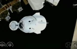 Capture d'écran d'une vidéo de la Nasa montrant la capsule Dragon de SpaceX se quittant la Station spatiale internationale (ISS), le 14 janvier 2026