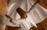 Des derviches tourneurs célèbrent le 750e anniversaire de la mort de Rumi, poète mystique soufi, fondateur de leur ordre, par une "sema" au centre culturel Mevlana, le 16 décembre 2023 à Konya, en Turquie
Les derviches tourneurs célèbrent le 750è 'seb-i arus', l'anniversaire de la mort de Rumi, poète mystique soufi, fondateur de leur ordre, par une "sema" le 17 décembre à Konya, la ville où il est inhumé. Konya, 17 décembre 2023.