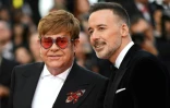 Le chanteur et compositeur britannique Elton John (g) et son mari, le producteur canadien David Furnish, le 16 mai 2019 Ă Cannes