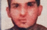 Photo prise le 15 novembre 2015 à Belgrade de la photo du passeport au nom d'Ahmad al Mohammad retrouvé au Stade de France à Saint-Denis