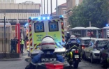 Des ambulances transportant les passagers français du MV Hondius arrivent à l'hôpital Bichat à Paris, le 10 mai 2026