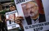 Des manifestants brandissent des portraits du journaliste Jamal Khashoggi devant le consulat saoudien à Istanbul, le 9 octobre 2018