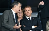 Le président du CNOSF Denis Masseglia discute avec Emmanuel Macron lors d'un match de la Ligue des nations de football entre la France et les Pays-Bas au Stade de France le 9 septembre 2018.
