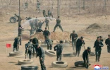 Photo diffusée par l'agence nord-coréenne KCNA, le 5 avril 2025, de soldats nord-coréens à l'entraînement dans un lieu indéterminé, le 4 avril 2025