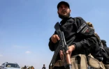 Les forces gouvernementales syriennes se déploient à Busra al-Harir, dans la province de Deraa, dans le sud de la Syrie, le 21 juillet 2025