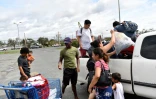 Des membres des familles Villalobos et Martinez secourues après le passage de l'ouragan Ida à Laplace, en Louisiane, le 31 août 2021
