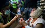 Un homme blessé à la suite de heurts avec les forces de l'ordre, le 5 août 2019 à Hong Kong