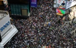 Manifestants pro-démocratie dans le quartier de Causeway Bay, à Hong Kong le 15 septembre 2019