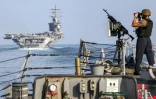 Photo, diffusée par le ministère américain de la Défense, du porte-avions de l'US Navy USS Dwight D. Eisenhower (CVN 69) (IKE) transitant par le détroit d'Ormuz, le 26 novembre 2023
