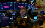 Des traders à la Bourse de New York, le 23 août 2019
