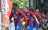 La joie de l'attaquant ivoirien de Crystal Palace, Wilfried Zaha, après avoir ouvert le score sur pénalty à domicile contre Tottenham, lors de leur match de Premier League, le 11 septembre 2021