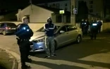 Des policiers perquisitionnent près du domicile à Chelles (Seine-et-Marne) de l'homme qui a ouvert le feu sur des policiers les Champs Elysées le 21 avril 2017