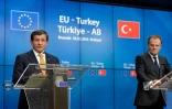 Le Premier ministre turc Ahmet Davutoglu et le président du Conseil européen Donald Tusk, lors d'une conférence de presse à Berlin, le 18 mars 2016