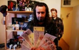 Xavier Samson, un fan de Johnny montre les billets des concerts auxquels il a assisté, chez lui à Caen le 5 décembre 2017