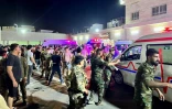 Des ambulances arrivent à l'hôpital de Hamdaniyah, en Irak, après un incendie meurtrier lors d'un mariage le 27 septembre 2023
