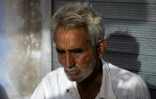 Sardar Meena pleure la mort de trois de ses filles et de deux de ses petits-enfants retrouvés dans un puits, le 28 mai 2022 à Dudu, dans l'Etat du Rajasthan, en Inde