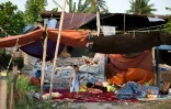 Les décombres d'une maison à Palu, dans l'île des Célèbes, après un séisme et le passage d'un tsunami, le 29 septembre 2018