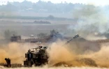 Un canon automoteur israélien tire en direction de Gaza, le 11 octobre 2023