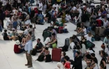 Des passagers en attente de train gare de Lyon à Paris, le 31 juillet 2024
