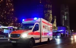 Une ambulance sur le site de l'attaque d'un camion, le 19 décembre 2016 à Berlin