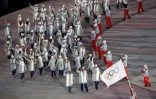 La délégation des Athlètes olympiques de Russie défilent, derrière la bannière olympique, le 9 février 2018 à Pyeongchang