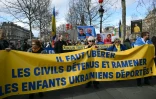 Manifestation pour la libération des civils détenus et le rapatriement des enfants ukrainiens déportés, à l'approche du quatrième anniversaire de l'invasion russe, le 21 février 2026 à Paris