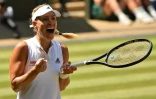 L'Allemande Angelique Kerber exulte après avoir battu la lettonne Jelena Ostapenko en demi-finales à Wimbledon, le 12 juillet 2018 