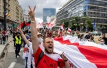 Manifestation de la diapora bélarusse en Pologne pour célébrer le 1er anniversaire de la contestation anti-Loukachenko, à Varsovie, le 8 août 2021