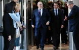 Michel Sapin et  Emmanuel Macron à leur arrivée à la cérémonie de passation de pouvoirs le 31 août 2016 à Bercy à Paris