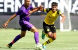 Le Brésilien Fabinho (g) évolue désormais à Liverpool, ici opposé au Borussia Dortmund, le 22 juillet 2018 à Charlotte, en Caroline du Nord