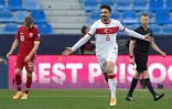 La joie du milieu de terrain turc, Ozan Tufan, après son but marqué contre la Norvége, lors de leur match de qualification (groupe G) pour la Coupe du monde 2022, le 27 mars 2021 à Malaga (Espagne)