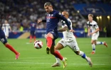 Le défenseur français Théo Hernandez face à la Finlande, lors des qualifications européennes pour le Mondial 2022 au Qatar, le 7 septembre 2021 au Groupama Stadium à Décines-Charpieu, près de Lyon