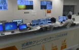 Des employés du centre de traitement des déchets Musashino Clean Center, le 18 janvier 2019 à Tokyo