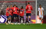 La joie des Lensois après le but de l'attaquant Jonathan Ikoné (c), lors du match de L1 à domicile contre Lens, le 18 octobre 2020 au stade Pierre-Mauroy
