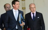 Le Premier ministre Manuel Valls et le ministre de l'Intérieur, à la sortie de l'Elysée le 19 juillet 2016 à Paris