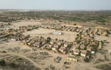 Vue aérienne du village de Foth, dans le nord du Sénégal, le 11 février 2025, construit par la société Eramet Grande Côte (EGC), filiale au Sénégal du groupe minier français Eramet, pour reloger les villageois déplacés dans cette région par l'exploitation minière menée par EGC depuis 2014