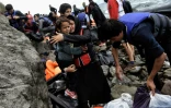 Migrants et réfugiés à leur arrivée le 30 septembre 2015 sur l'île grecque de Lesbos
