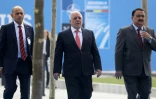 Le Premier ministre irakien Haider al-Abadi (C) à Bruxelles où il a participé à une réunion sur la lutte antijihadistes, le 12 juillet 2018