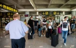 Touristes à l'aéroport de Palma de Mallorque le 27 juillet 2020