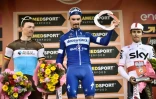Le Français Julian Alaphilippe (c) remporte Milan-Sanremo le 23 mars 2019 devant le Belge Oliver Naesen (g) et le Polonais Michal Kwiatkowski