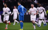 La star de la Juventus Turin Cristiano Ronaldo au milieu de plusieurs joueurs lyonnais lors du 8e de finale aller de Ligue des champions remporté 1 à 0 par Lyon le 26 février 2020