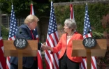 Le président américain Donald Trump et la Première ministre britannique Theresa May se serrent la main à l'issue d'une conférence de presse, le 13 juillet 2018 à Chequers, près d'Ellesborough, au nord-ouest de Londres